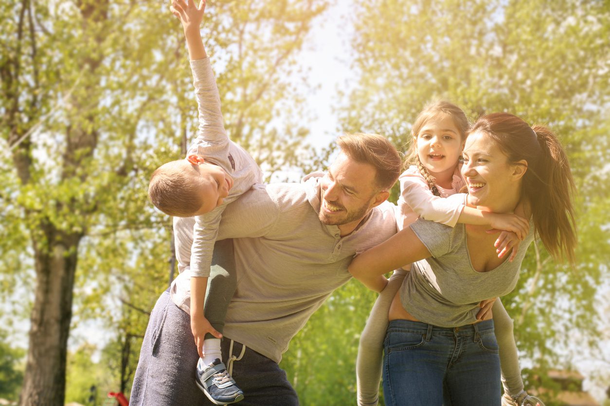 Happy family outdoor.